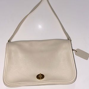 Coach creme colored vintage crossbody purse